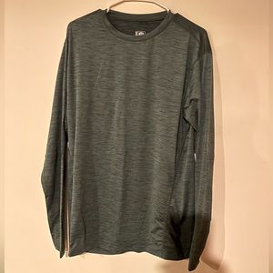 Born primitive large never worn long sleeve green